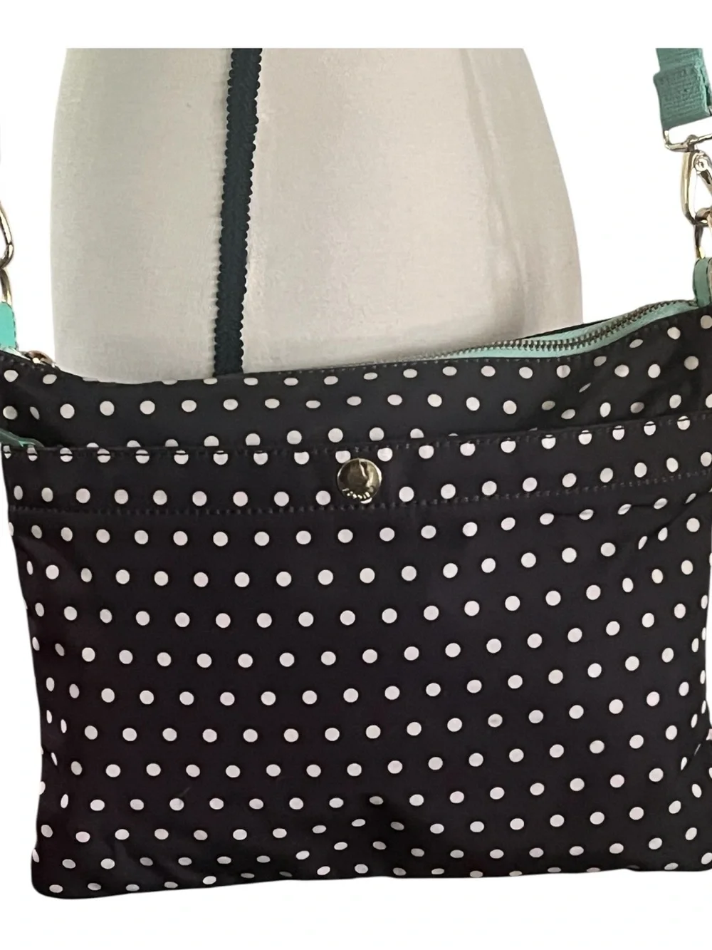 Fossil Keyper polka dot crossbody with mint aqua adjustable strap.